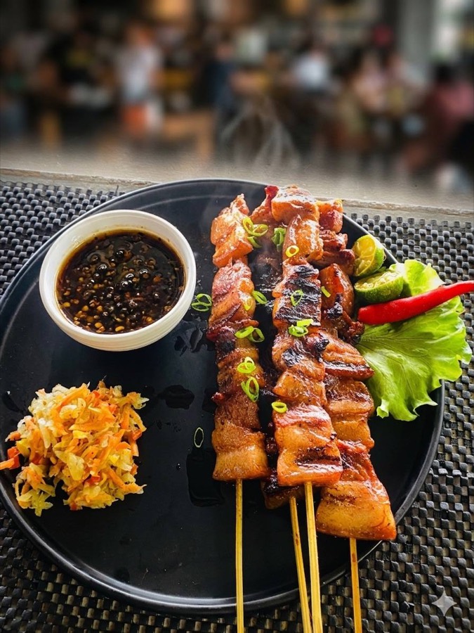 Grilled barbecue skewers served at Laaganan