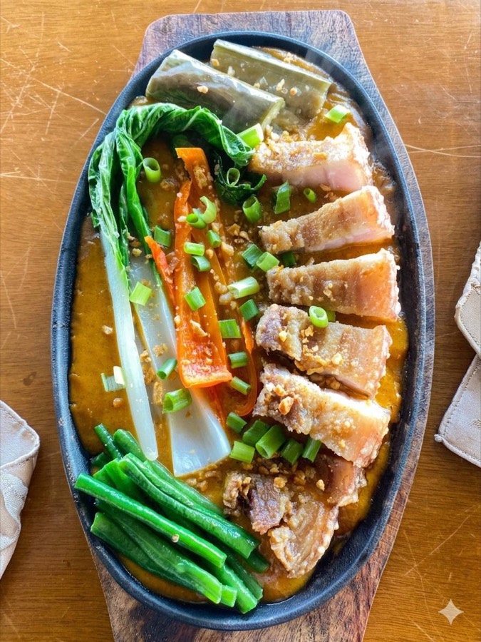 Pork bistek, a signature dish at Laaganan