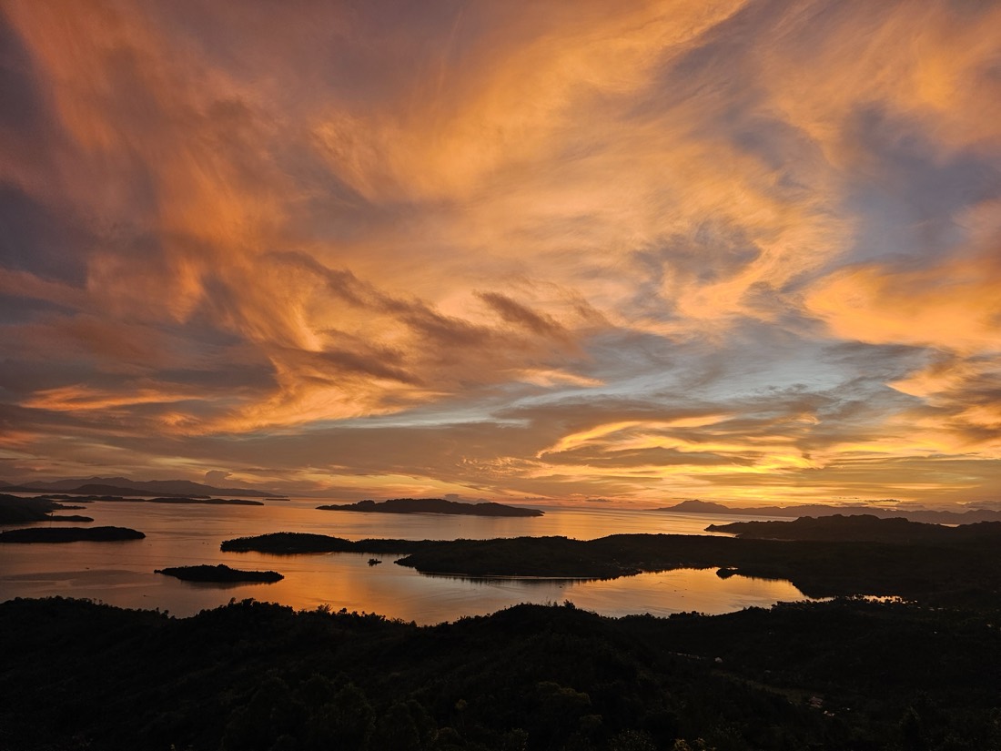 Golden sunset skies above the sea and islands
